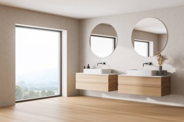Beyaz duvarlı modern banyo, yuvarlak aynalı iki lavabo ve pencere ışığı. 3d oluşturma