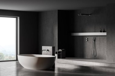 Koyu gri banyo, beyaz küvet ve pencerenin yanında duş, yan görüş. Modern gri mermer banyonun minimalist tasarımı 3 boyutlu, insan yok.