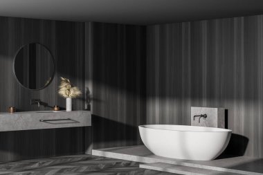 Parke zeminli karanlık banyo, beyaz küvet ve yuvarlak aynalı iki lavabo, yan görüş. Modern mobilyaları ve pencereleri olan minimalist siyah banyo, 3 boyutlu, kimseyi göstermiyor.