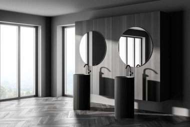 Modern banyonun beton zemininde, tahta duvarlı ve panoramik pencereli yuvarlak aynaları olan rahat iki lavabo. 3d oluşturma