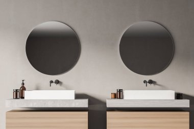 Modern banyo iç mekanının ön tarafı eko minimalist tarzda iki lavabo ve aynayla çevrili. İnsan yok. 3B Hazırlama.