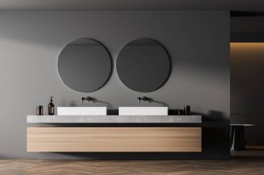 Modern banyo içi çift lavabolu, kahverengi ahşap parke zeminli eko minimalist tarzda. Ve iki yuvarlak ayna. İnsan yok. 3B Hazırlama