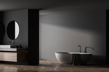 Lavabo ve beyaz küvetli modern banyo kahverengi ahşap parke zeminli eko minimalist tarzda. Ve iki yuvarlak ayna. Pencereden gelen ışık ve gölgeler. İnsan yok. 3B Hazırlama