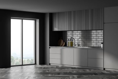 Koyu gri ahşap mutfak seti ve güverte, aletler, yan görüş, güneş ışığı olan pencere. Parke zemin üzerinde gri lüks mutfak, 3 boyutlu, kimseyi göstermiyor.