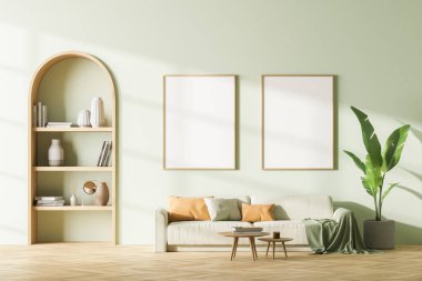 Modern iç planda iki adet poster çerçevesi, kanepesi, kitap rafı ve bitkisi olan oturma odası. 3B görüntüleme