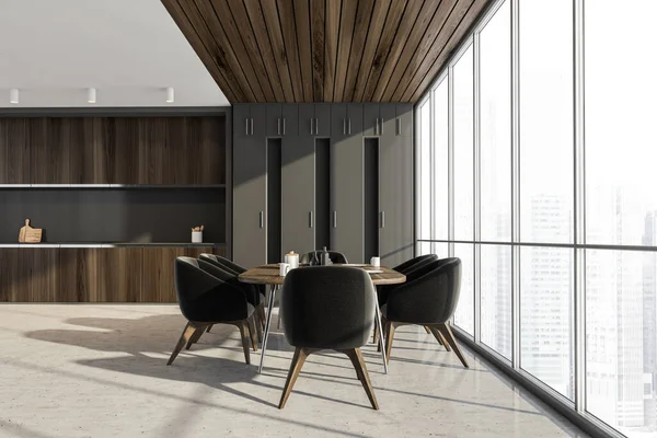 Grey dining room with city view on skyscrapers. Dining table with dishes and six chairs. Kitchen set with shelf, 3D rendering no people