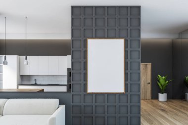Açık uzayın iç kısımlarında beyaz kanepeli bir tuval posteri. Mutfak arka planda, minimalist modern stüdyo dairede, 3D 'de hiç kimse yok.