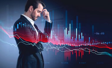 Dijital grafik çöküyor, takım elbiseli ofis müdürü dalgın dalgın duruyor, düşünce yöneticisi. Önplanda hisse senedi istatistikleri, şamdanlar değişiyor