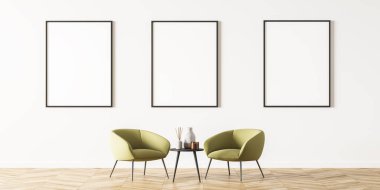 Parlak, modern oda içi, meşe ağacından parke üzerine yerleştirilmiş iki yeşil kemer ve koyu kahve sehpası. Beyaz duvar üç dikey posterle süslenmiş. Model yap. 3d oluşturma