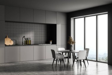 Koyu gri modern mutfak, panoramik pencereli yemek alanı. Yemek için masa ve sandalyelerle döşenmiş. Beton zemin. 3d oluşturma.