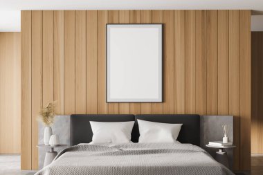 Yatak odası, yastıklar, gri döşemeler ve dekorasyonlu kahve masaları. Model fotokopi çerçevesi 3 boyutlu, şık mobilyaları olan uyku odasında.