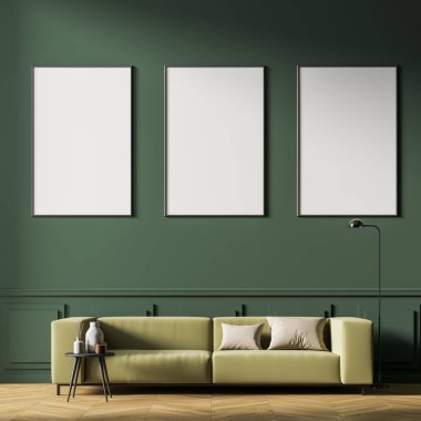 İskandinav oturma odasının içinde meşe ağacından parke üzerinde rahat yeşil bir kanepe ve yeşil duvarda üç beyaz dikey poster var. Minimalist stil tasarımı. Model yap. 3d oluşturma