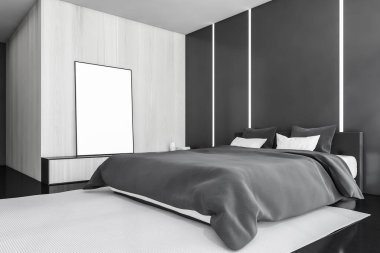 Ahşap yatak odasının içinde boş tuval posteri, siyah zemin üzerinde mobilyalar, yan manzara. Duvarda arka ışık ve çekmecede büyük afiş var. 3D, kimseyi göstermiyor.