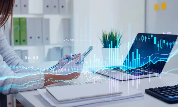 Businesswoman hands with phone, stock market changes, office interior. Double exposure of blue and violet, growing numbers, candlesticks and online trading