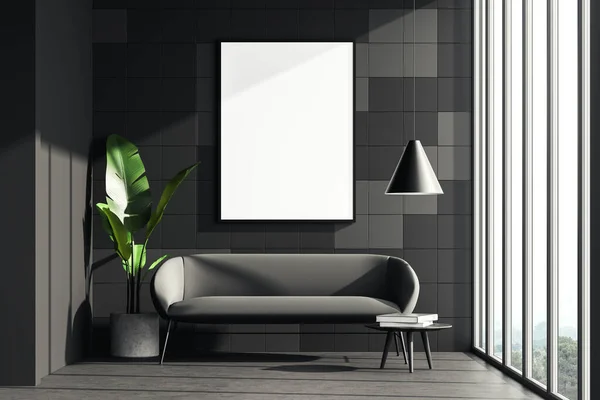 Dark living room interior with a grey cosy sofa, small coffee table and houseplant. Tiled wall is decorated with a poster. Panoramic window has a brilliant countryside view. Mock up. 3d rendering