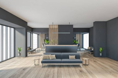 Karanlık modern minimalist ofis odası içi rahat gri kanepe, ahşap parke zemin, panoramik pencere, resepsiyon masası, bilgisayar, cam bölme. İş adamları için buluşma yeri kavramı