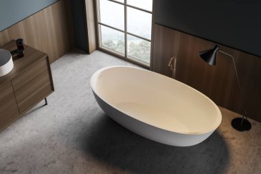 Beyaz küveti, lavabosu, çekmecesi, üst manzarası, beton zemini olan koyu bir banyo. Taşralı modern iç mekan ve pencere, 3D, kimseyi göstermiyor