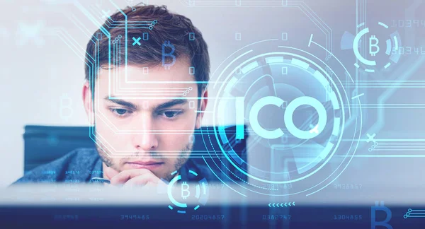 Office man in front of the computer, double exposure with initial coin offering with circuit connection and numbers. Concept of cryptocurrency and bitcoin