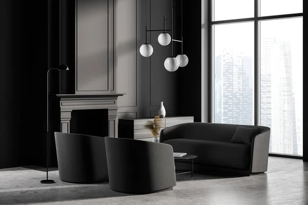 Dark living room interior with fireplace, two black armchairs and sofa, coffee table and lamps on concrete floor. Guest room with minimalist furniture, side view, window with skyscrapers, 3D rendering