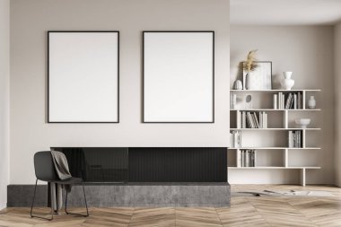 Bej oturma odası içi gri koltuklu battaniyeli, arka planda kitaplık şömineli minimalist sanat odası. İki boş fotokopi alanı tuvali, sanat odası, 3D görüntüleme