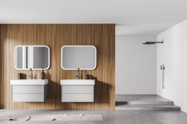 İki ayrı lavabo, çekmeceler, aynalar ve jel şişeleriyle aydınlık bir banyo. Gri zeminli minimalist duş, 3 boyutlu, kimseyi göstermiyor