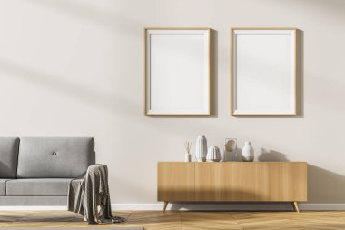 Oturma odasının içinde duvarında iki boş beyaz poster, gri meşe ağacından parke döşeme, halı. Sıcak buluşma yeri kavramı. Model yap. 3d oluşturma