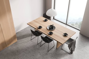 Yemek odasının dekorasyon masası ve dört siyah sandalyesi olan şık ahşap ve beton döşeme. Ev dekorunun minimalist tarzı. Manzaralı panoramik pencere. Üst Manzara. 3d oluşturma