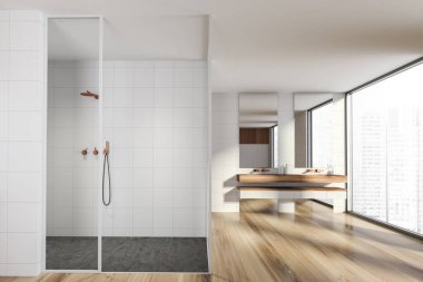 Cam duş kabini, çift lavabo tezgahı ve bronz muslukları olan modern tasarım banyo. Gökdelenler şehir manzaralı panoramik pencere. Tahta parke ve beyaz fayanslı duvarlar. 3d oluşturma.