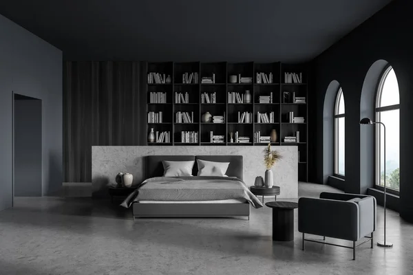 有床的灰色卧室内部 混凝土地板上有衬里 有书籍和装饰的大书架 有灯和咖啡桌的扶手椅 有窗户的艺术卧室 3D渲染没有人 — 图库照片