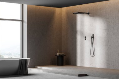 Minimalist duşlu, beyaz küvetli, yan manzaralı, kırsal pencereli karanlık bir banyo. Modern mobilyalar ve beton zemin ile banyo içi, 3 boyutlu, kimseyi yansıtmıyor.