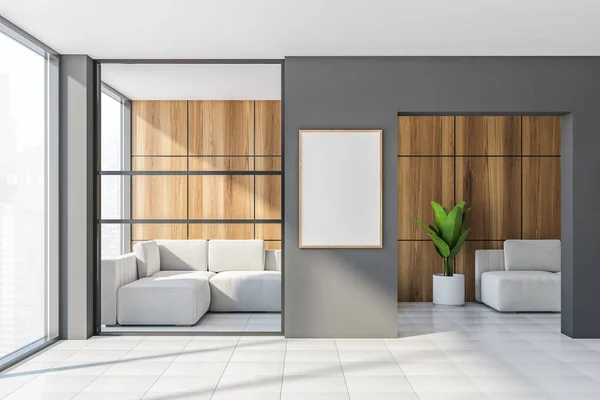 Interior of modern office with gray and wooden walls, tiled floor, panoramic windows and two white sofas. Vertical mock up poster frame. 3d rendering