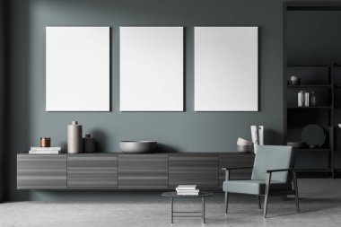 İçi uzun ahşap komodinli, içinde kitaplar, vazolar, koltuklar ve beton zeminde kahve masası olan mavi bir sanat odası. Duvarda üç boş kare kopyalama alanı, 3B oluşturma