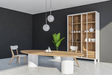 İçi masa, iki sandalye, çanak çömlek ve sürgülü cam kapaklı dolap, koyu gri duvarlar, avize, kapalı bitki ve beton zemin. 3d oluşturma