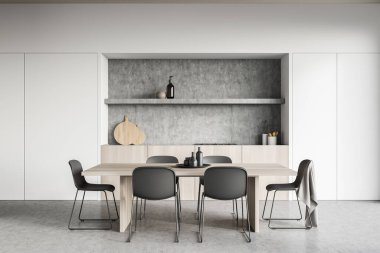 Mutfak odasının içinde yemek masası, altı sandalye, beton zemin, elektrikli tencere ve çanak çömlek var. Çağdaş İskandinav minimalist tasarımı. Yemek için güzel bir yer. 3d oluşturma