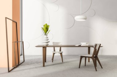 Ahşap masa, iki sandalye, çerçeveler, ev bitkisi olan vazo, beyaz duvar ve beton döşemeli yaratıcı sanatçılar odası. Minimalist tasarımda buluşmak için uygun yer kavramı. 3d hazırlayıcı