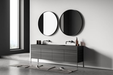 Moda duş odasının içinde modern ev tasarımı konsepti, duvarında iki yuvarlak ayna ve arka planında bir pencere olan koyu gri renkli gösteriş. 3d oluşturma