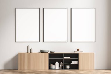 Bekleme odasının açık bej duvarındaki üç sıra maket posterler. Büfe ve parke döşeme için ahşap malzeme kullanan modern ev tasarımı. Minimalist bir kavram. 3d oluşturma.