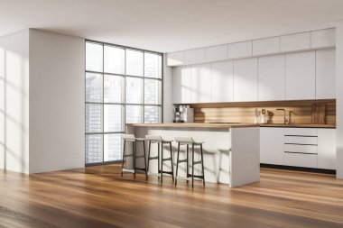 Mutfak odasının iç tarafı boş beyaz duvarla çevrili.