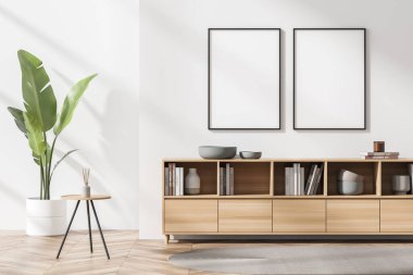 Galeri odasının içinde duvarında iki beyaz poster, kitaplar, kitaplık, büfe, çanak çömlek, sehpa ve meşe ağacından parke döşeme. Minimalist tasarım kavramı. Model yap. 3d oluşturma