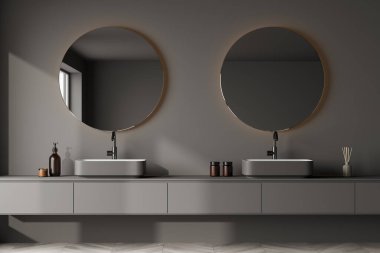 Yüzen lavaboları ve modern koyu gri banyo içinde aydınlatma ile iki yuvarlak aynaları ile raf gösteriş moda tasarım ile. Minimalist bir kavram. 3d oluşturma