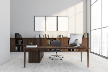 Beyaz ofisin iç kısımlarında içi boş üç poster ve bir ofis sandalyesi ve büfesi olan koyu ahşap bir masa. Açık ahşap döşeme. Model yap. Modern panoramik bina tasarımı konsepti. 3d oluşturma