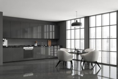 Panoramik gri mutfak iç kısmının köşesi. Yemek masasını çevreleyen dört beyaz koltuk ve bir modüler dolap. Beton zemin. Modern apartman tasarımı kavramı. 3d oluşturma