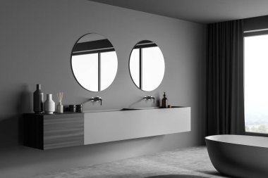 Koyu gri bir banyo manzarası, panoramik manzarası, modaya uygun ayrıntılar, seramik bir banyo, iki yuvarlak aynası ve beton döşemesi olan modern bir kibir. Minimalist tasarım. 3d oluşturma