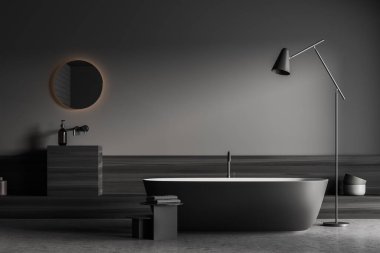 Koyu banyo manzaralı küvet, gri duvar, yuvarlak ayna, havlular ve beton zemin. Rahatlamak için minimalist tasarım kavramı. 3d oluşturma
