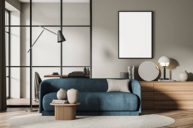 Bej oturma odasındaki tuvalde bir büfe, aksanlı mavi bir kanepe ve arka planda çerçeve cam bölmeli bir yemek odası var. Parke. Model yap. Minimalist bir kavram. 3d oluşturma