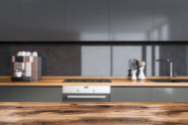 Koyu renk mutfak odasının içini elektrikli fırın, kahve makinesi ve çanak çömlekle yakından görebiliriz. Çağdaş İskandinav minimalist tasarımı. Reklam için iyi bir gösteri. 3d oluşturma