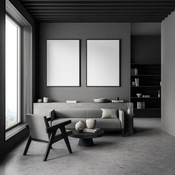 黑暗的灰色客厅墙上有两幅画布 上面有水泥地板 一个窗台 一张咖啡桌 一张舒适的扶手椅和一张沙发 把它弄坏了现代室内设计的概念 3D渲染 — 图库照片