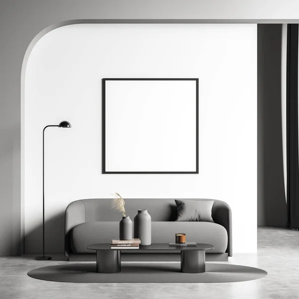 Square canvas on the white wall of the living room interior with an archway over a grey sofa. Modern design, using trends and a concrete floor. Mock up. Minimalist concept. 3d rendering