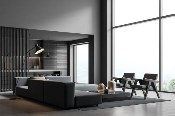 Corner of the dark grey panoramic living room with modern trends and the kitchen interior with a breakfast bar on the background. Concrete floor. A concept of modern house design. 3d rendering