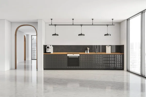 白色的内部与时尚的黑色厨房与简化的橱柜和框架与三个灯 灰色混凝土地面 拱门和木制细节 现代厨房设计理念 3D渲染 — 图库照片